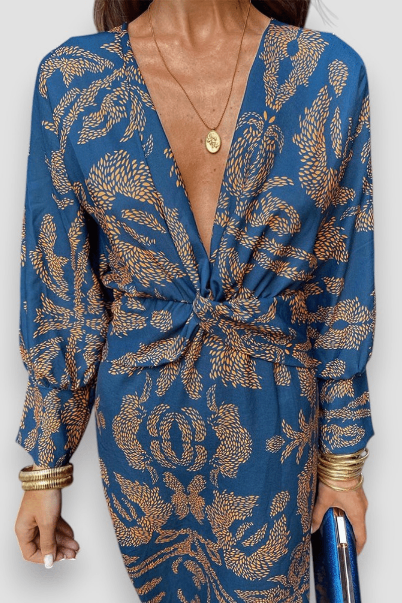 Elegantní midi šaty s twist detailem a květinovým motivem – nadčasové a stylové
